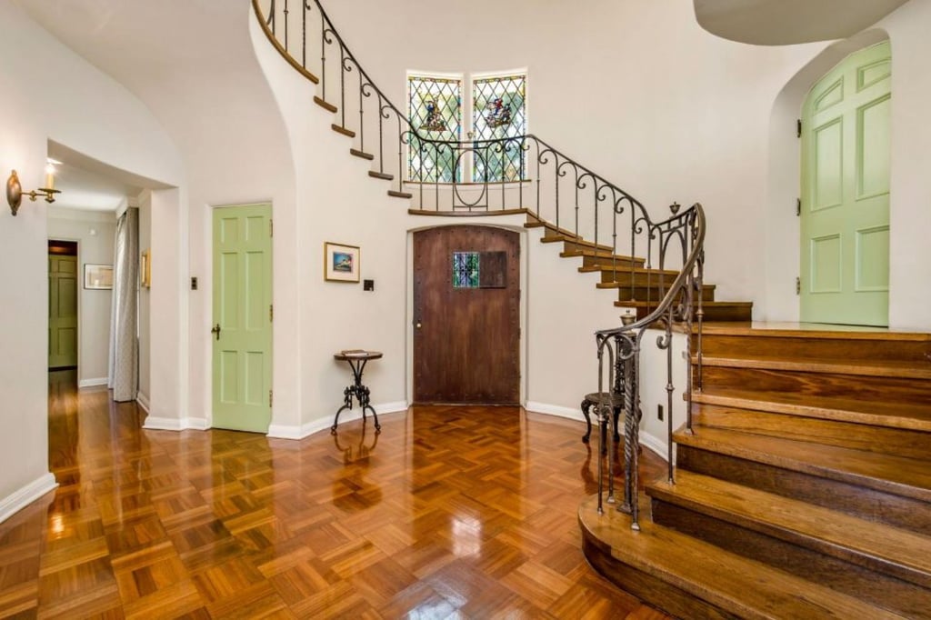 The dramatic entry features a spiral staircase. Photo: TheLuxLevel The dramatic entry features a spiral staircase. Photo: TheLuxLevel