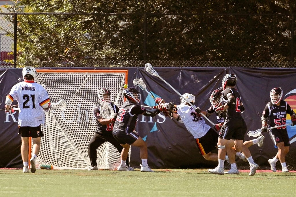Wesley Wong (second from left) made eight saves against Germany. Photo: Hong Kong, China Lacrosse Association