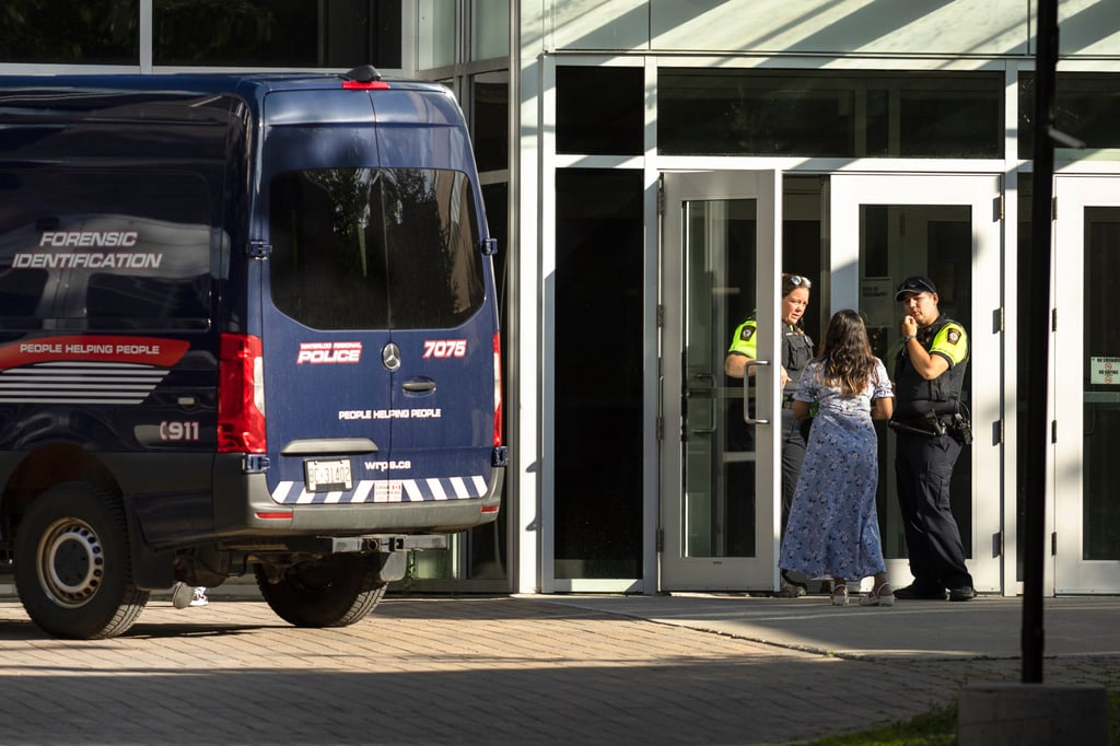 Members of the Waterloo Regional Police investigate a stabbing at the University of Waterloo in Ontario, Canada on Wednesday. Photo: Canadian Press via AP