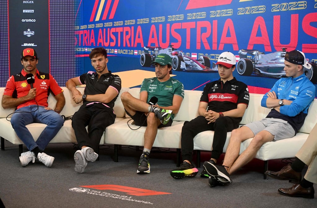 Zhou Guanyu (fourth from left) and his fellow drivers answer questions ahead of the Austrian Grand Prix. Photo: AFP