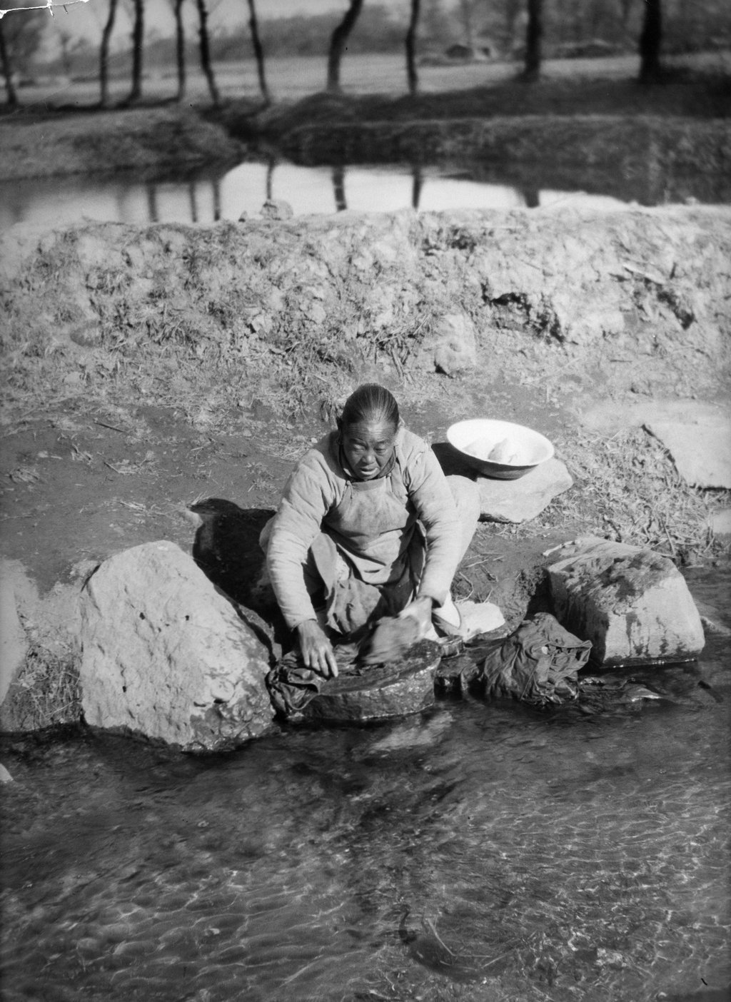 Even in the 20th century, doing laundry was hard physical work, as this photo, taken around 1931, of a woman in China washing her clothes in the Yellow River shows. Photo: Getty Images Even in the 20th century, doing laundry was hard physical work, as this photo, taken around 1931, of a woman in China washing her clothes in the Yellow River shows. Photo: Getty Images