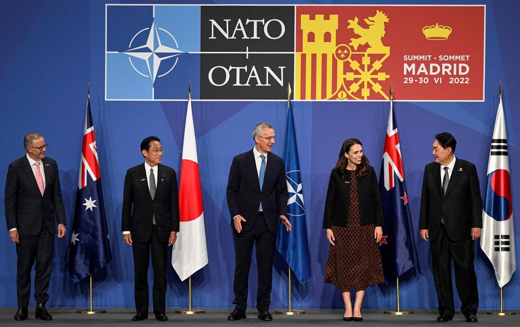 Nato Secretary General Jens Stoltenberg (centre) with the leaders of Australia, Japan, New Zealand and South Korea last summer. Photo: AFP