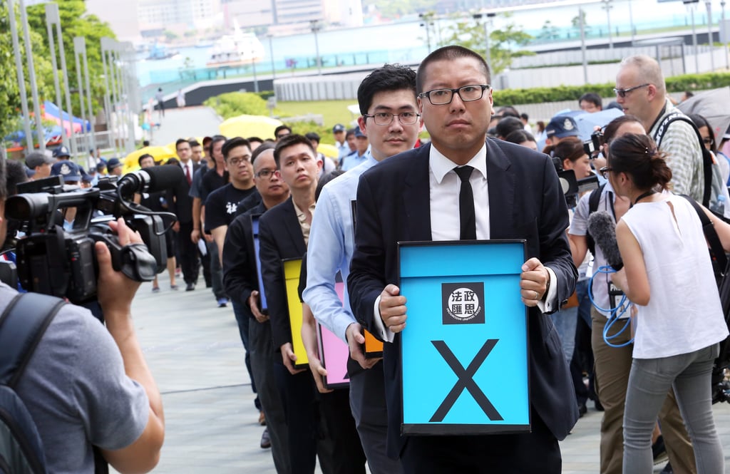 Kevin Yam takes part in a rally in a support of a political reform bill in June 2015. He is now living in Melbourne according to his Facebook page, which has 6,947 followers. Photo: Felix Wong