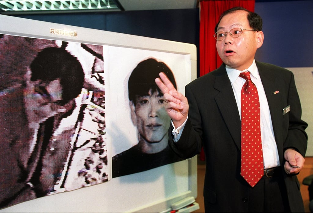 Police in 2001 show pictures of an unidentified gang member (left) believed to be led by Kwai Ping-hung (right). Photo: Robert Ng Police in 2001 show pictures of an unidentified gang member (left) believed to be led by Kwai Ping-hung (right). Photo: Robert Ng