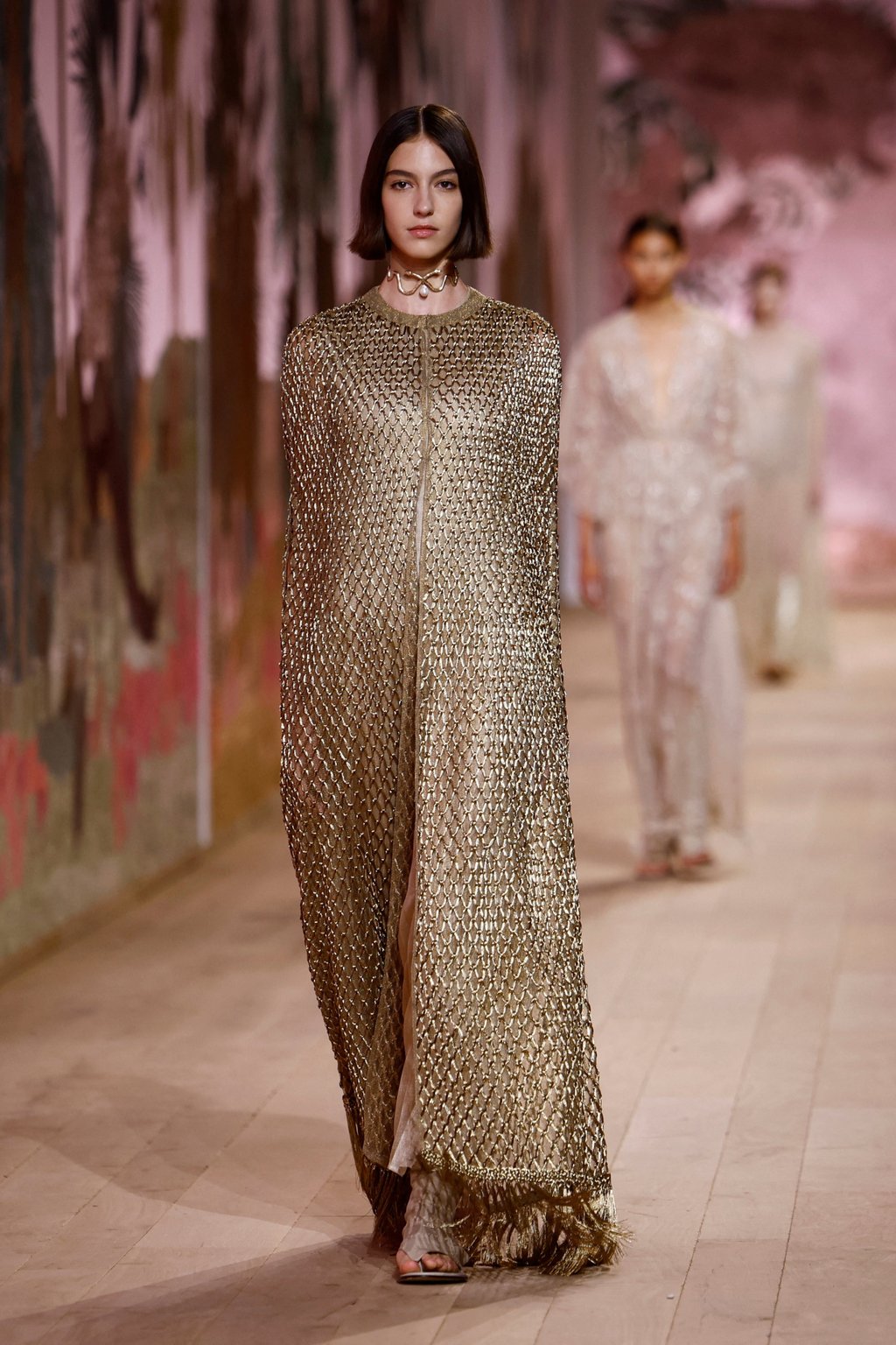 Models, resembling exquisite deities, seemed to float by onlookers at Maria Grazia Chiuri’s show. Photo: Reuters