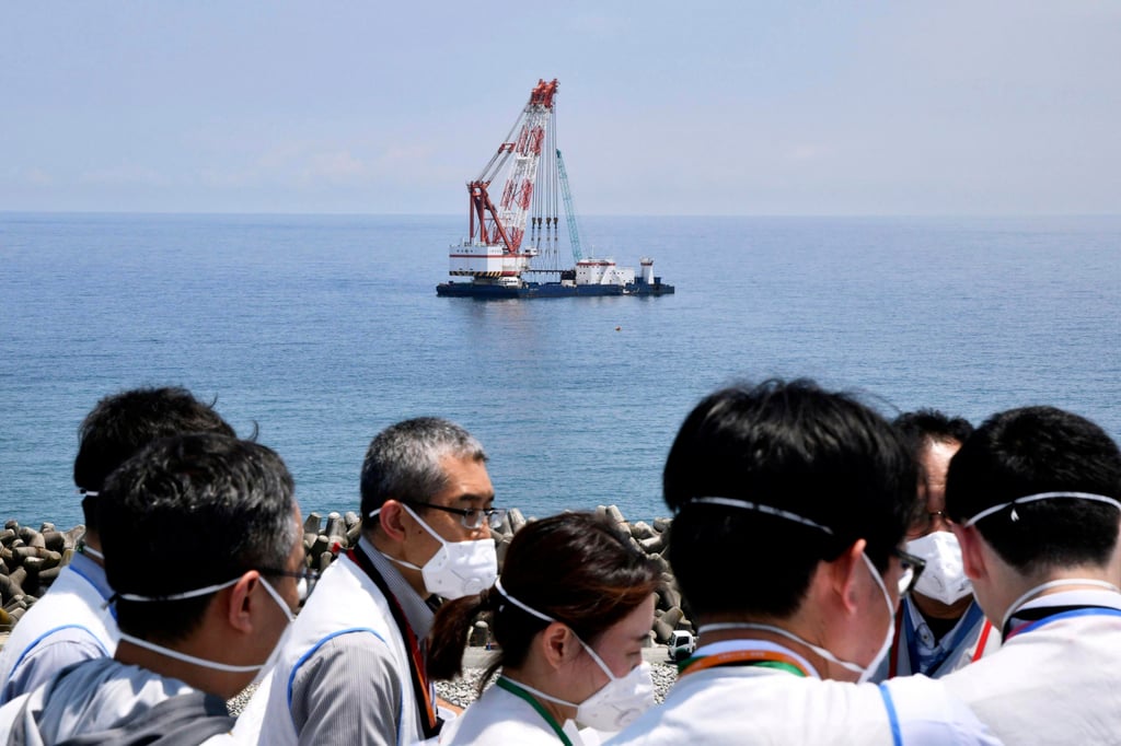A work ship is seen offshore where Tokyo Electric Power Company said it has installed the last piece of an undersea tunnel to be used to discharge the treated waste water, during a media tour to the Fukushima Daiichi nuclear power plant in northern Japan on June 26. Photo: AP A work ship is seen offshore where Tokyo Electric Power Company said it has installed the last piece of an undersea tunnel to be used to discharge the treated waste water, during a media tour to the Fukushima Daiichi nuclear power plant in northern Japan on June 26. Photo: AP