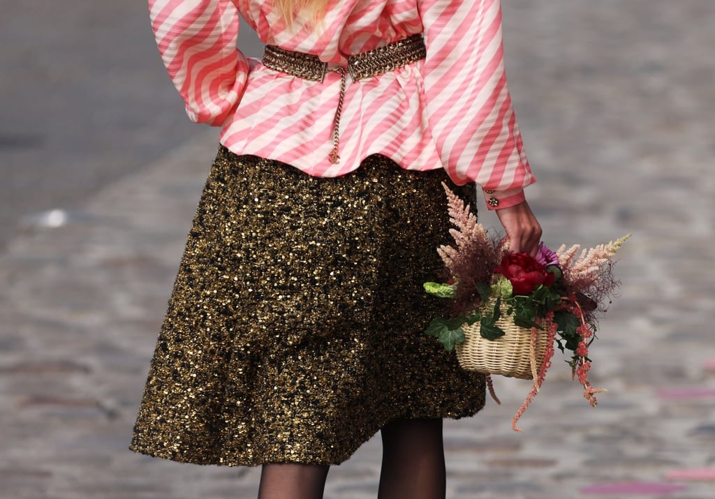 Despite the sparkle and gleam of golden heels and buttons, Virginie Viard’s collection embraced a comforting simplicity. Photo: Xinhua Despite the sparkle and gleam of golden heels and buttons, Virginie Viard’s collection embraced a comforting simplicity. Photo: Xinhua