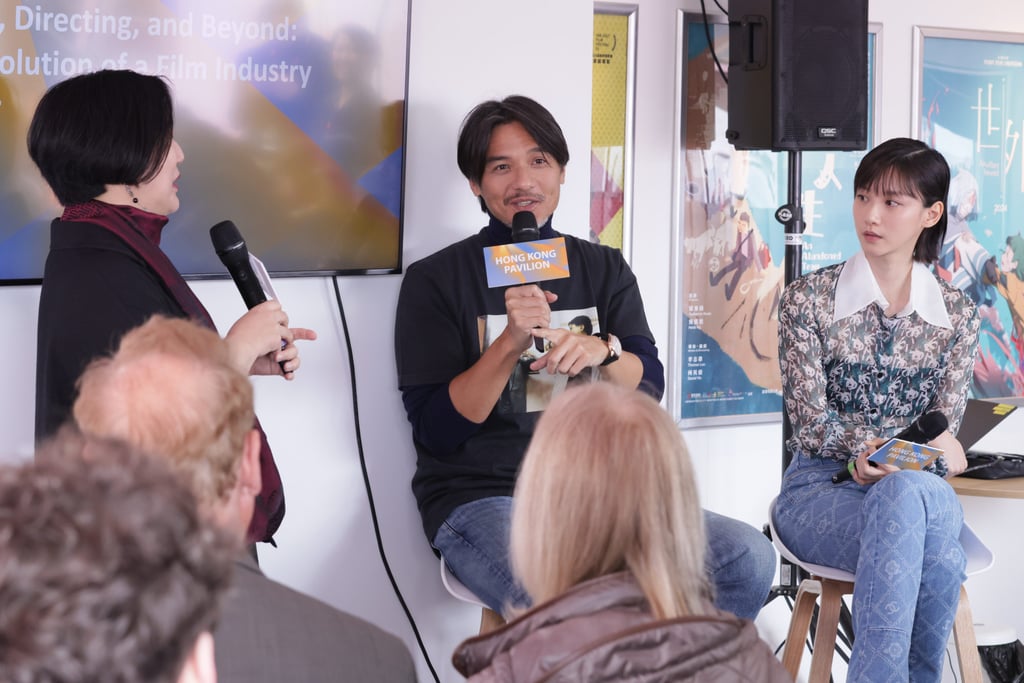 Fung (middle) chose to wear a T-shirt featuring a classic scene from A Better Tomorrow at the Marché du Film in Cannes this May. Photo: Marché du Film Fung (middle) chose to wear a T-shirt featuring a classic scene from A Better Tomorrow at the Marché du Film in Cannes this May. Photo: Marché du Film