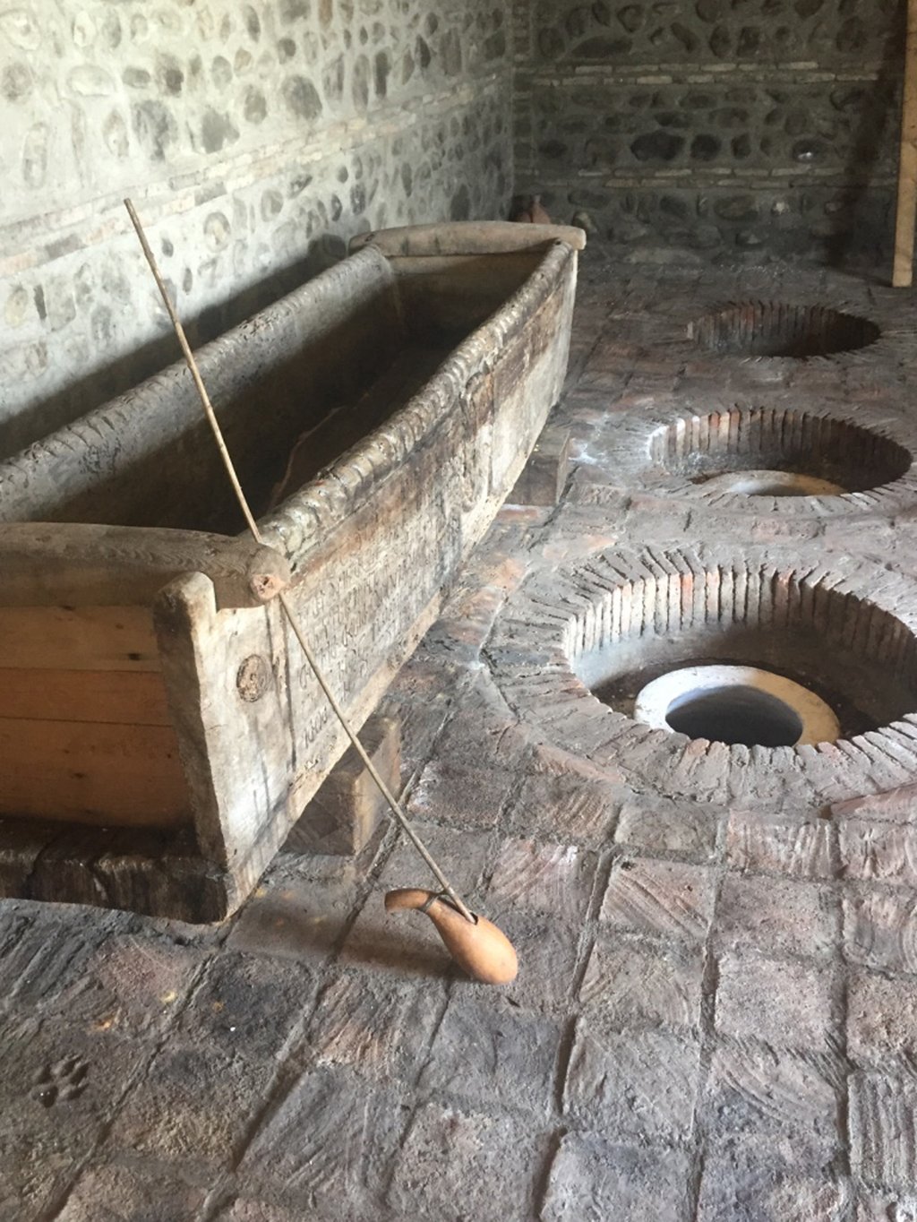 Qvevri are clay vessels used in wine production that are unique to Georgia.