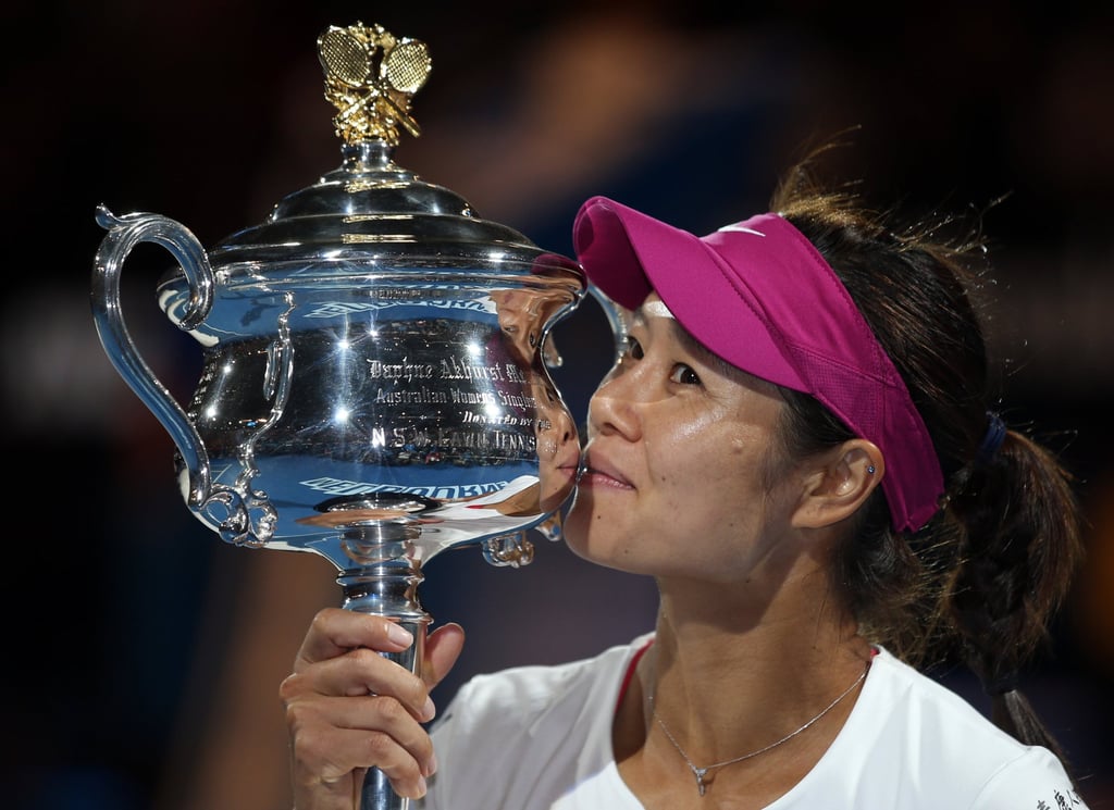 Li Na of China kisses the championship trophy after defeating Dominika Cibulkova of Slovakia in their women’s singles final at the 2014 Australian Open. Photo: AP Li Na of China kisses the championship trophy after defeating Dominika Cibulkova of Slovakia in their women’s singles final at the 2014 Australian Open. Photo: AP