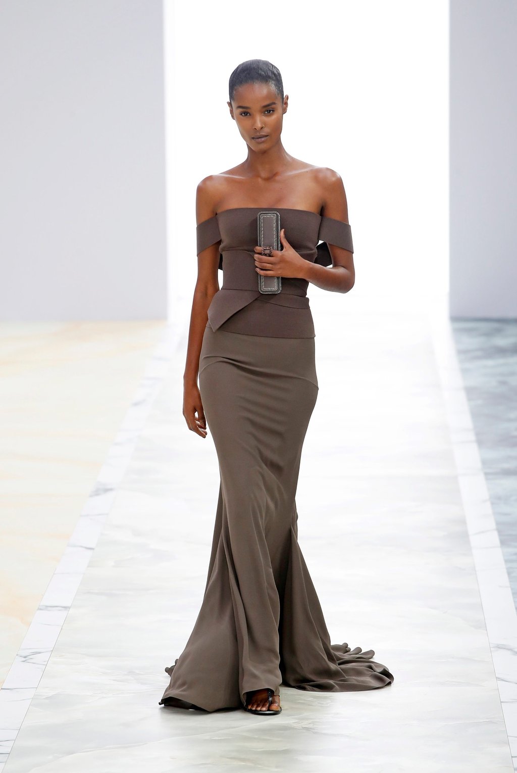 At Fendi, Kim Jones presented a deceptively simple collection, which was met with enthusiastic applause. Photo: Xinhua At Fendi, Kim Jones presented a deceptively simple collection, which was met with enthusiastic applause. Photo: Xinhua