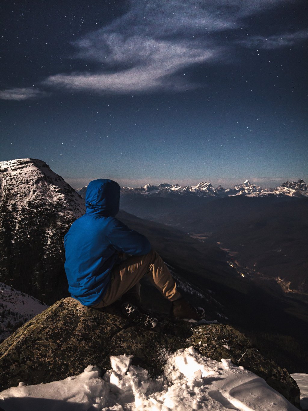 A hiker watches the skies above Mount Robson, the highest mountain of the Canadian Rockies, during a winter starry night. Photo: Shutterstock A hiker watches the skies above Mount Robson, the highest mountain of the Canadian Rockies, during a winter starry night. Photo: Shutterstock