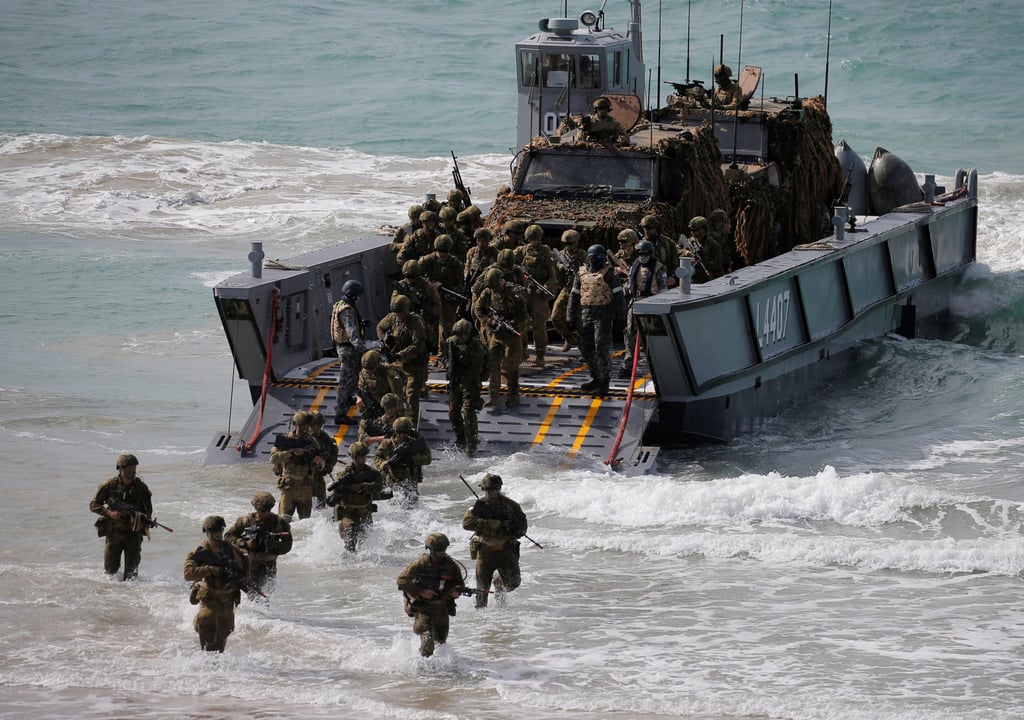 Australian troops practise an amphibious assault landing during a previous Talisman Sabre joint military exercise in 2017. Photo: Reuters Australian troops practise an amphibious assault landing during a previous Talisman Sabre joint military exercise in 2017. Photo: Reuters