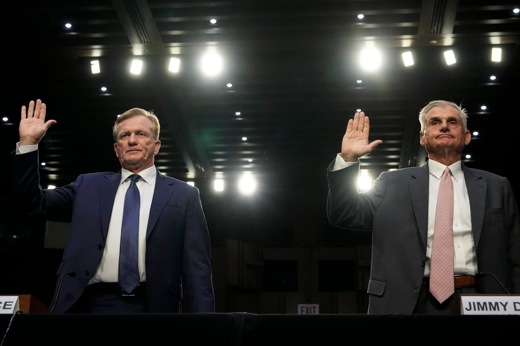 PGA Tour Ron Price COO (left) and policy board member Jimmy Dunne are sworn in during a Senate Homeland Security Subcommittee on Investigations hearing. Photo: TNS PGA Tour Ron Price COO (left) and policy board member Jimmy Dunne are sworn in during a Senate Homeland Security Subcommittee on Investigations hearing. Photo: TNS