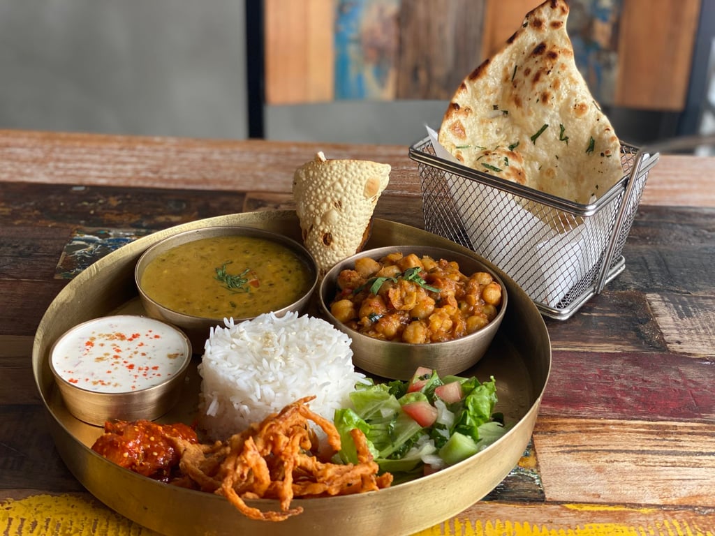A hearty Indian style set lunch menu with vegetarian and non-vegetarian options that come along with equally mouthwatering side dishes at Goa Nights. Photo: Handout