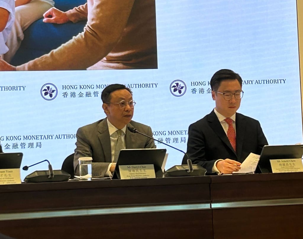 HKMA deputy CEO Darryl Chan (left) and Wong Tsz-cheuk, head of Greater China FX Cash and EM rates trading at HSBC, address the local media on Silver Bond sale in Central on July 14. Photo: SCMP