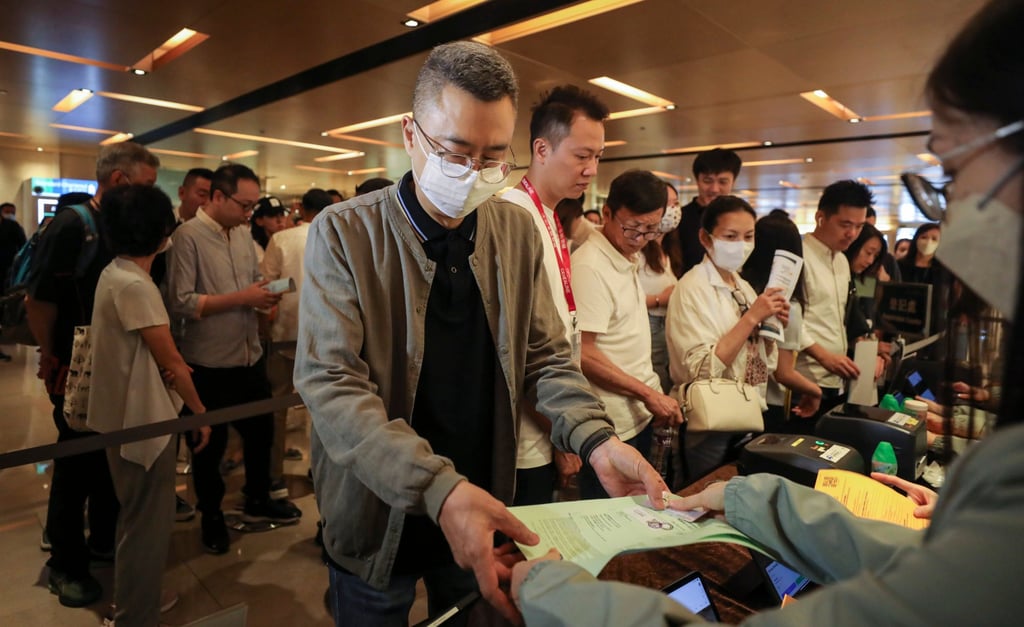 People queue at the Kerry Centre in Quarry Bay to buy units at La Montagne on July 15, 2023. Photo: SCMP / Xiaomie Chen