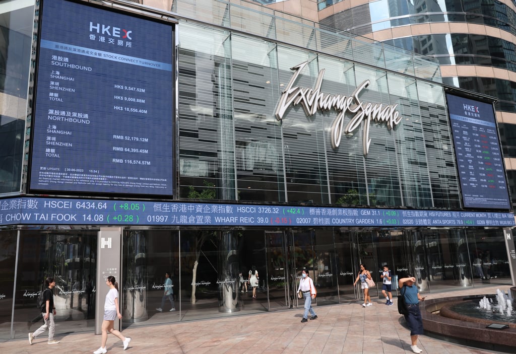 People pass Exchange Square, which houses the Hong Kong stock exchange, in Central on June 30, 2023. Photo: Yik Yeung-man People pass Exchange Square, which houses the Hong Kong stock exchange, in Central on June 30, 2023. Photo: Yik Yeung-man