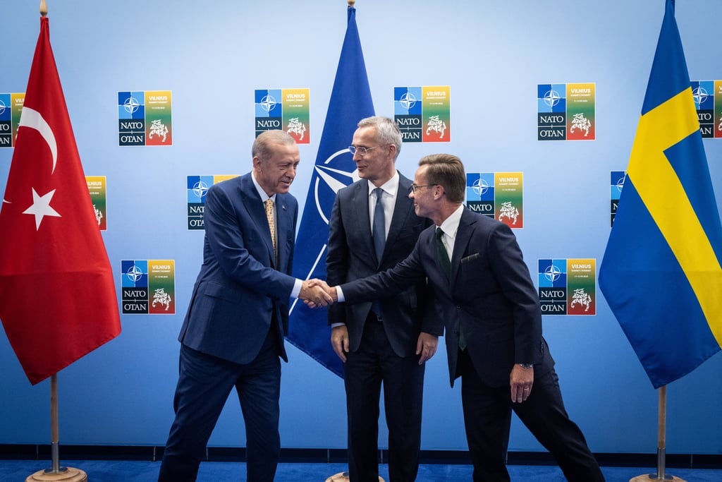 Nato Secretary General Jens Stoltenberg (centre) looks on as Turkish President Recep Tayyip Erdogan (left) shakes hands with Swedish Prime Minister Ulf Kristersson on July 10 before their meeting ahead of the Nato summit in Vilnius, Lithuania. Photo: DPA