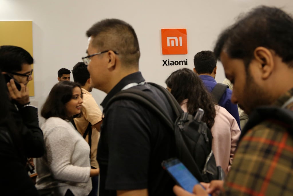 Guests gather to check out Xiaomi Corp’s newly launched products at an event in Bangalore, India, on September 17, 2019. Xiaomi plans to partner with various domestic vendors to help widen its bricks-and-mortar retail presence in the world’s second-largest smartphone market behind China. Photo: AP Guests gather to check out Xiaomi Corp’s newly launched products at an event in Bangalore, India, on September 17, 2019. Xiaomi plans to partner with various domestic vendors to help widen its bricks-and-mortar retail presence in the world’s second-largest smartphone market behind China. Photo: AP
