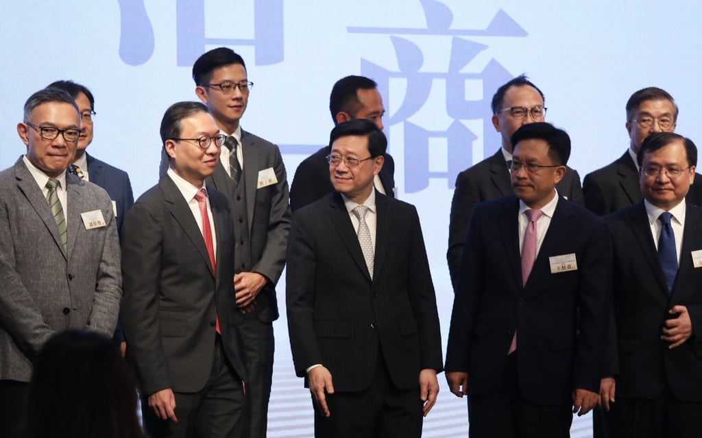 Hong Kong leader John Lee (first row, centre) with officials at a Tuesday legal forum. Photo: Yik Yeung-man Hong Kong leader John Lee (first row, centre) with officials at a Tuesday legal forum. Photo: Yik Yeung-man