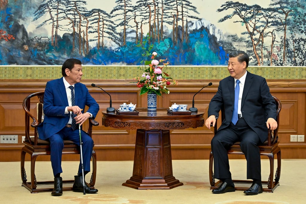 Rodrigo Duterte meets Xi Jinping at the Diaoyutai State Guesthouse. Photo: Xinhua via AP Rodrigo Duterte meets Xi Jinping at the Diaoyutai State Guesthouse. Photo: Xinhua via AP