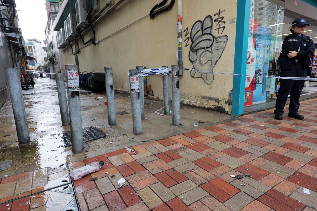 An electric water heater exploded in a flat, raining debris onto the street. Photo: Jelly Tse