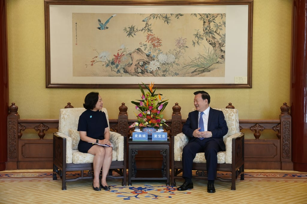 Secretary for Home and Youth Affairs Alice Mak meets Xia Baolong, director of the Hong Kong and Macau Affairs Office. Photo: Handout