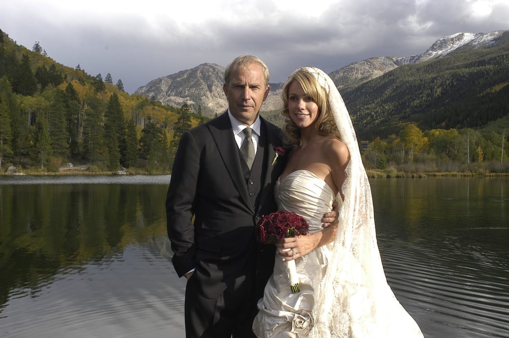 Christine Baumgartner and Kevin Costner at their wedding on his ranch in Aspen, Colorado, in 2004. Photo: Getty Images