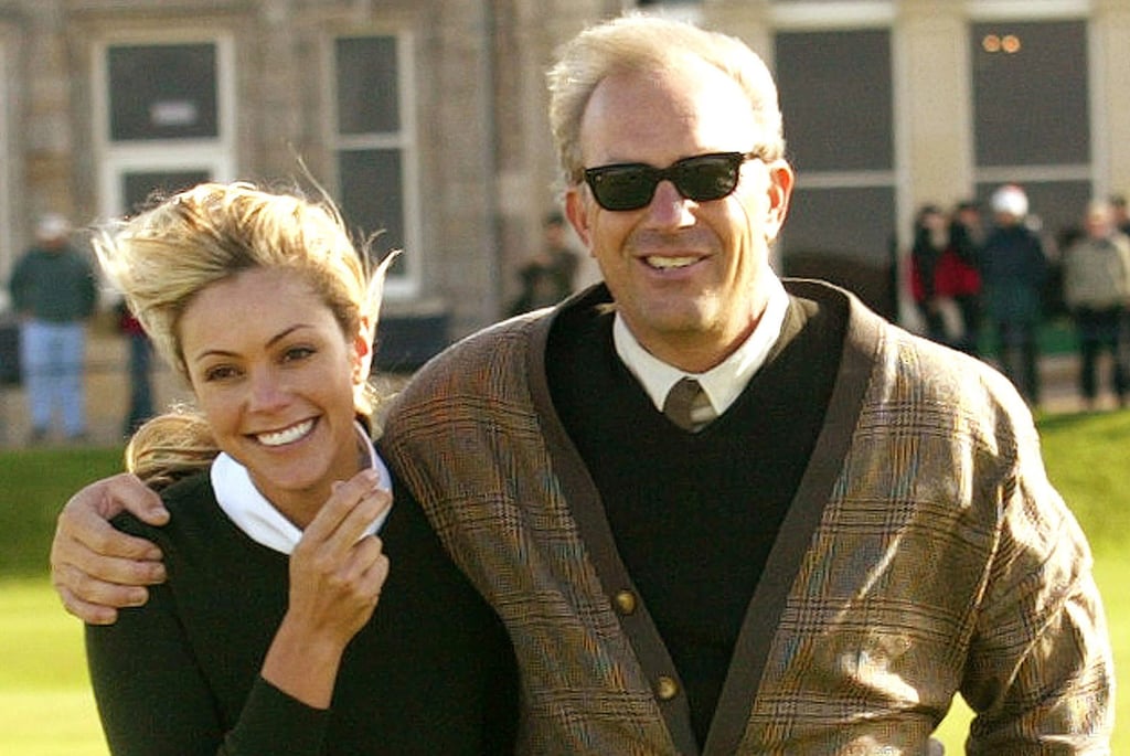 US actor Kevin Costner walks with his wife Christine Baumgartner during a practice round for the Dunhill Links Championship at St Andrews Golf Club in Fife, Scotland, in 2004. Photo: Reuters