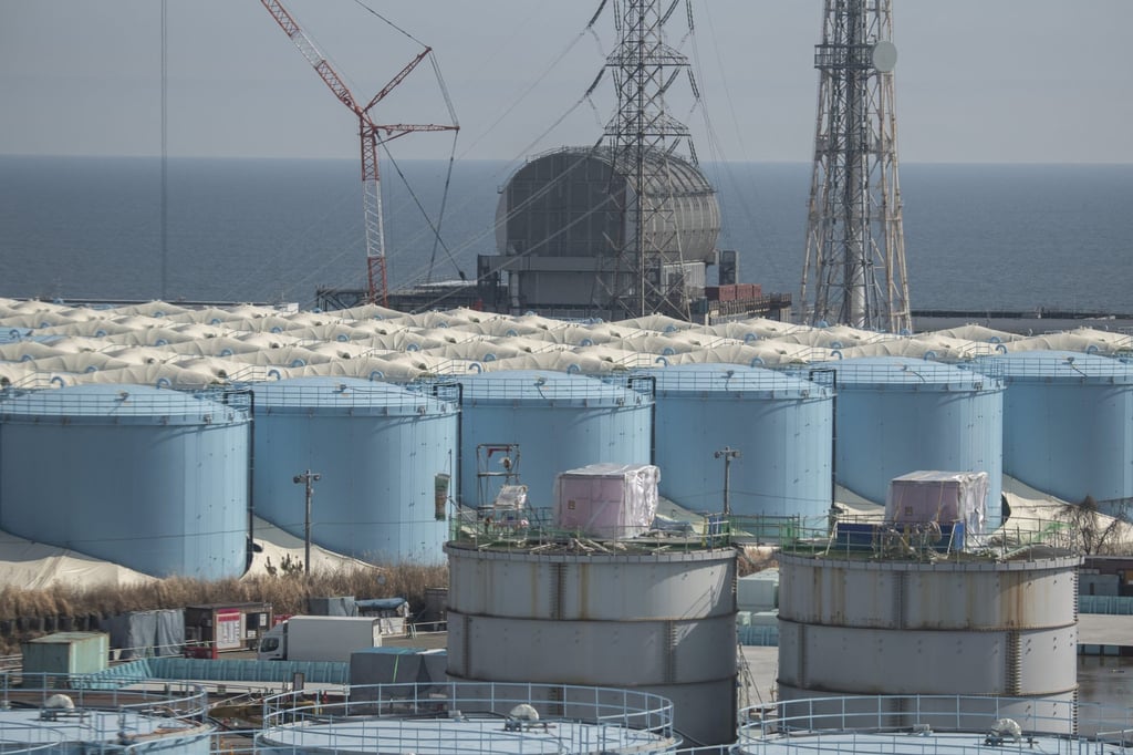 The unit 3 reactor building and storage tanks for contaminated water at the Daiichi nuclear power plant in Okuma, Fukushima prefecture. Photo: AFP