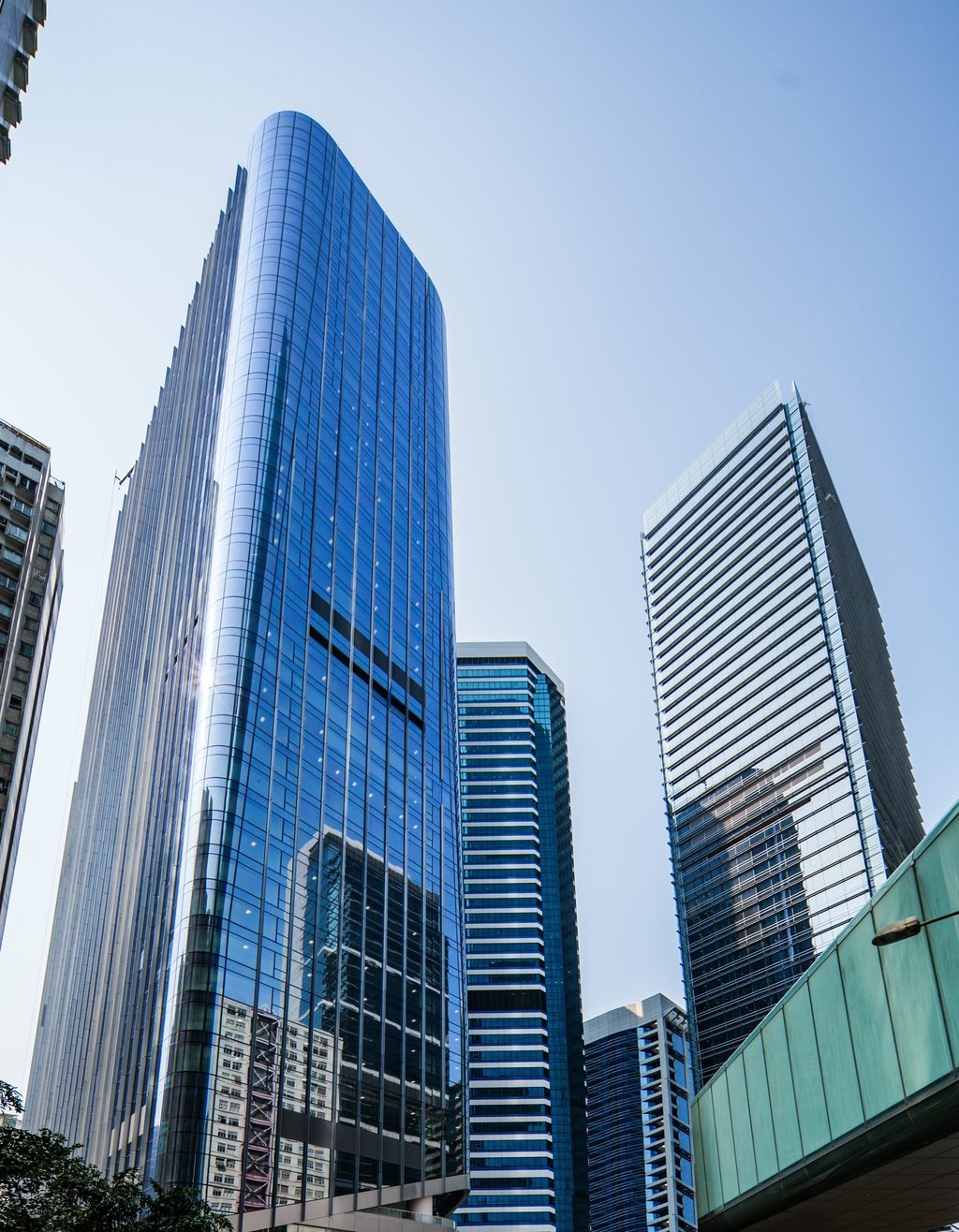 Swire Properties’ Two Taikoo Place in Quarry Bay (left) has been designed to contribute to sustainability goals. Parent company Swire Pacific has instituted internal carbon pricing this year. Photo: Handout