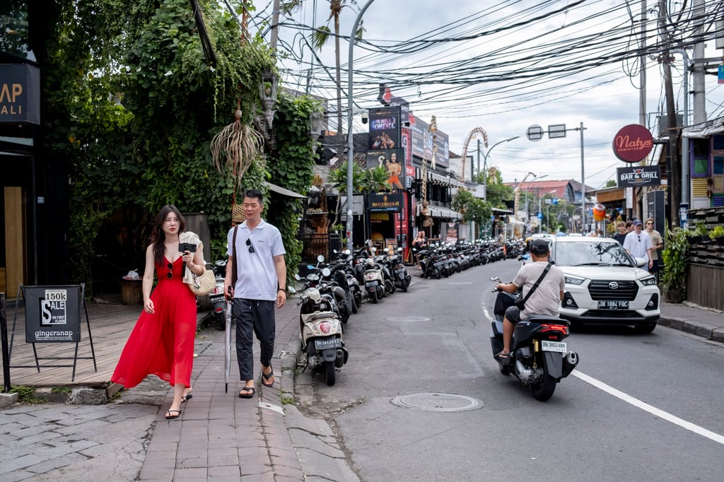 Tourists in Seminyak. Bali has in recent months come down hard on the undesirables to protect the country’s tourism image as it slowly recovers from the pandemic. Photo: EPA-EFE Tourists in Seminyak. Bali has in recent months come down hard on the undesirables to protect the country’s tourism image as it slowly recovers from the pandemic. Photo: EPA-EFE