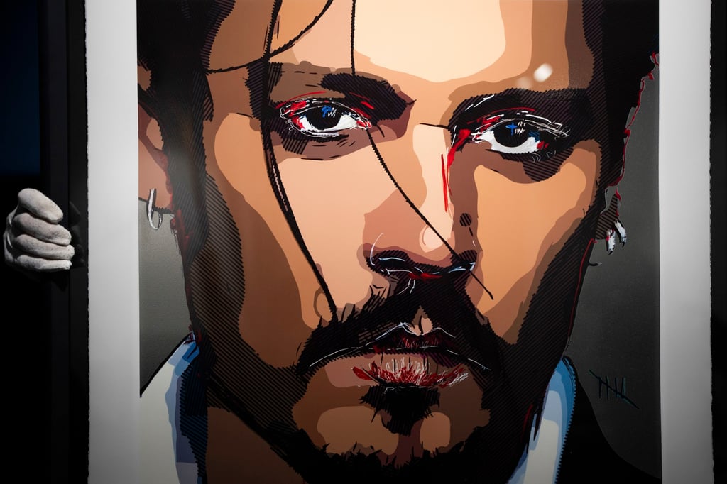 A self-portrait by actor Johnny Depp is displayed at Castle Fine Art gallery on July 20, in London. Photo: Invision/AP A self-portrait by actor Johnny Depp is displayed at Castle Fine Art gallery on July 20, in London. Photo: Invision/AP