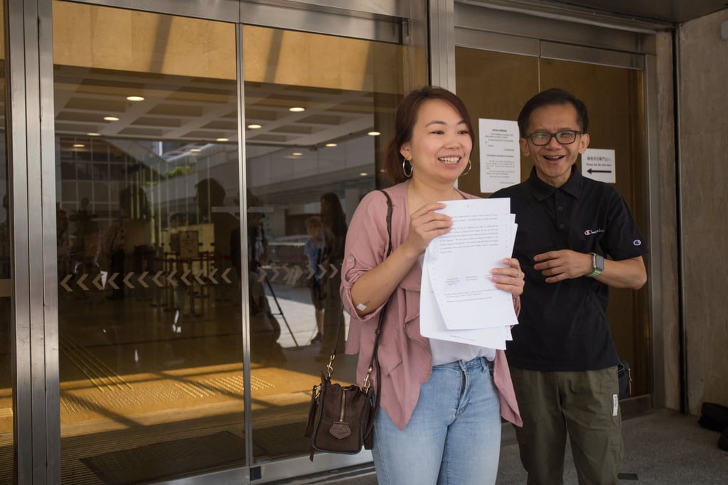 Alice Leung and Philip Chiu, relatives of two of the victims, stand outside the High Court after learning about Wednesday’s ruling. Photo: Brian Wong