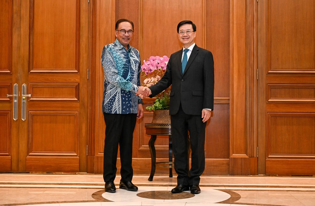 Hong Kong’s leader Lee (right) meets Malaysian Prime Minister Anwar Ibrahim in Kuala Lumpur. Photo: Handout Hong Kong’s leader Lee (right) meets Malaysian Prime Minister Anwar Ibrahim in Kuala Lumpur. Photo: Handout