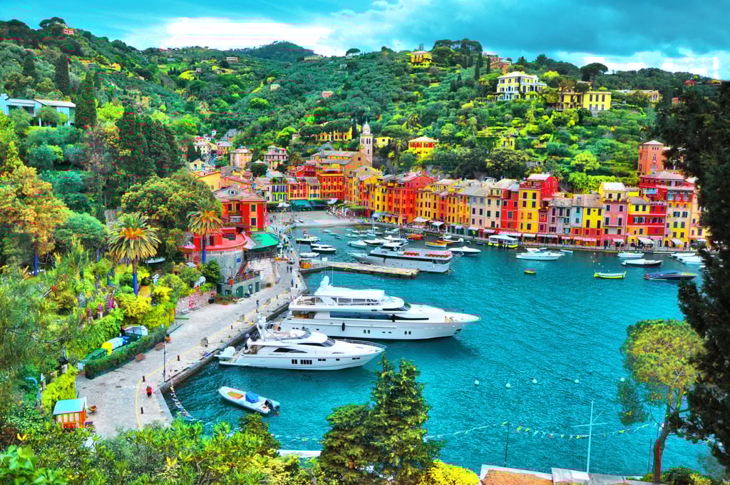 The beautiful Portofino with colourful houses and villas, luxury yachts and boats in little bay harbour. Photo: Shutterstock