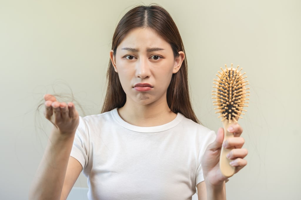 Covid-19, which is believed to cause hair loss in some cases, led to women taking to TikTok to share their hair-loss tribulations. Photo: Shutterstock Covid-19, which is believed to cause hair loss in some cases, led to women taking to TikTok to share their hair-loss tribulations. Photo: Shutterstock