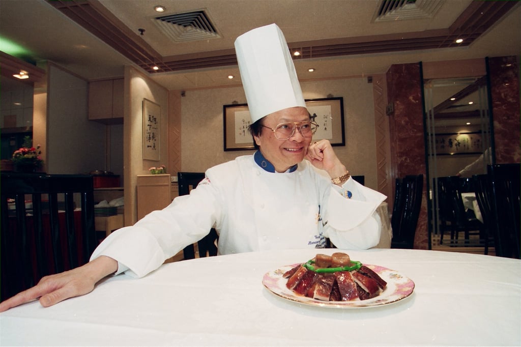 Chef Yeung is photographed in 1996 as he serves up a plate of roast duck, a traditional Lunar New Year favourite. Photo: SCMP