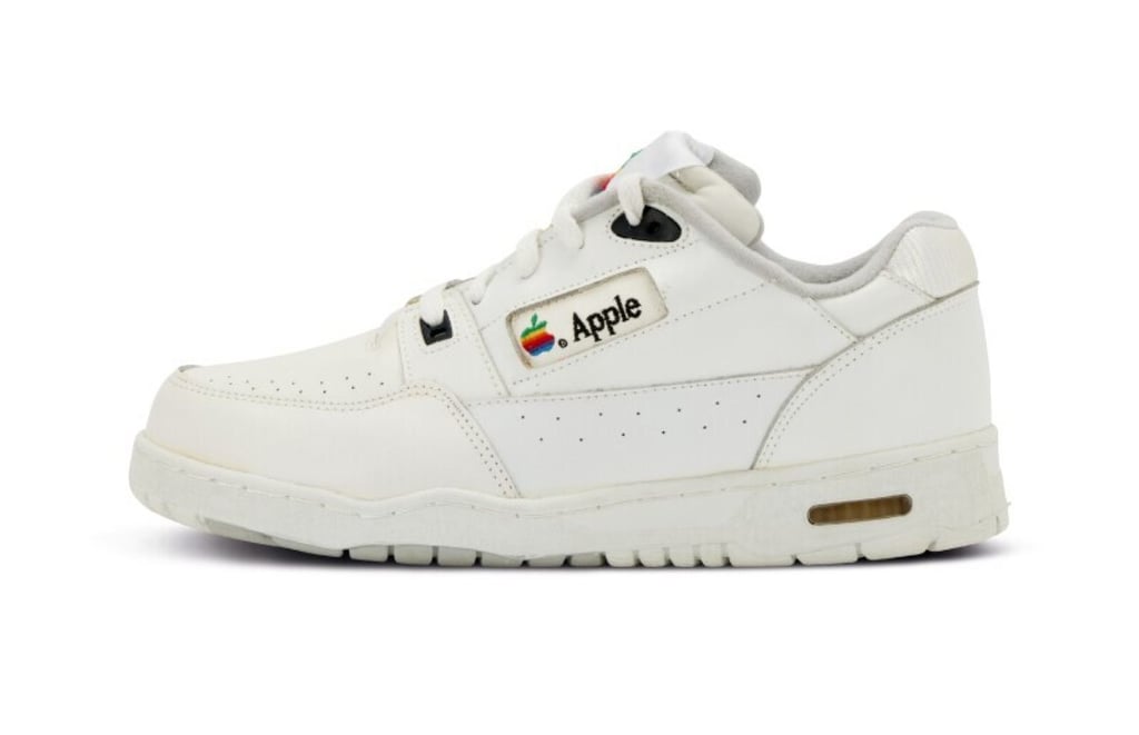 The Apple trainers feature a rainbow Apple logo on the sides. Photo: Sotheby’s The Apple trainers feature a rainbow Apple logo on the sides. Photo: Sotheby’s