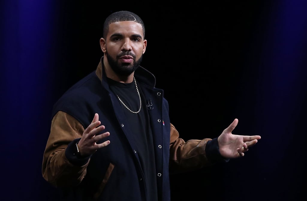 Drake wearing a vintage Apple letterman jacket at an Apple Music event. Photo: Getty Images Drake wearing a vintage Apple letterman jacket at an Apple Music event. Photo: Getty Images