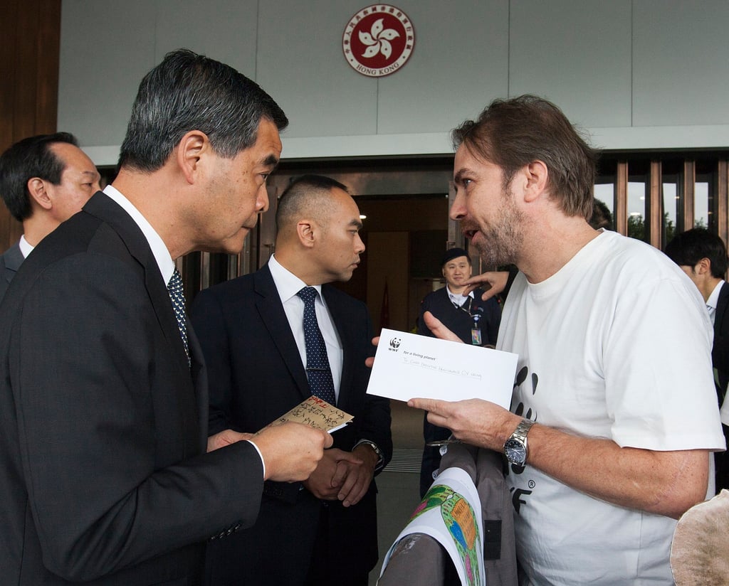 Gavin Edwards (right) hands a petition to stamp out the illegal ivory trade in 2016 on behalf of WWF to then-Hong Kong chief executive Leung Chun-ying. Gavin Edwards (right) hands a petition to stamp out the illegal ivory trade in 2016 on behalf of WWF to then-Hong Kong chief executive Leung Chun-ying.