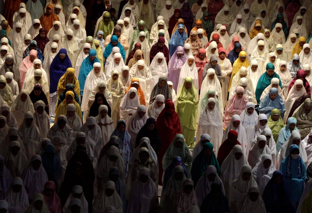 Muslims at an evening prayer session to mark the holy month of Ramadan. Women are typically expected to pray behind men in traditional Islamic prayer. Photo: Reuters Muslims at an evening prayer session to mark the holy month of Ramadan. Women are typically expected to pray behind men in traditional Islamic prayer. Photo: Reuters