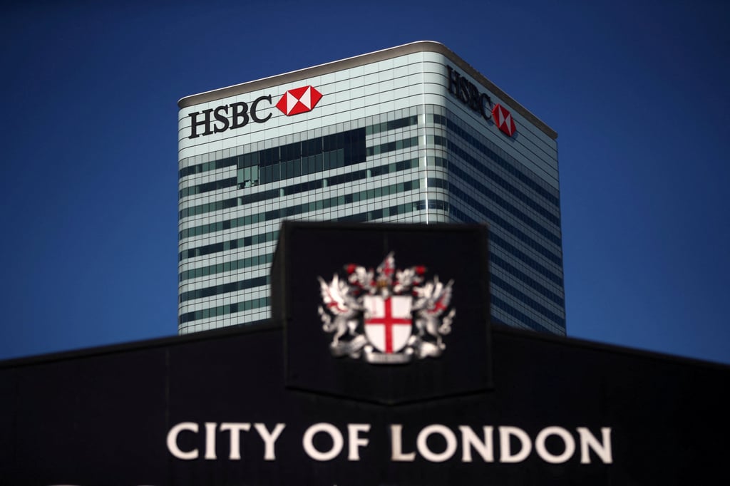 HSBC’s building in Canary Wharf is seen behind a City of London sign outside Billingsgate Market in London on August 8, 2018. Photo: Reuters HSBC’s building in Canary Wharf is seen behind a City of London sign outside Billingsgate Market in London on August 8, 2018. Photo: Reuters