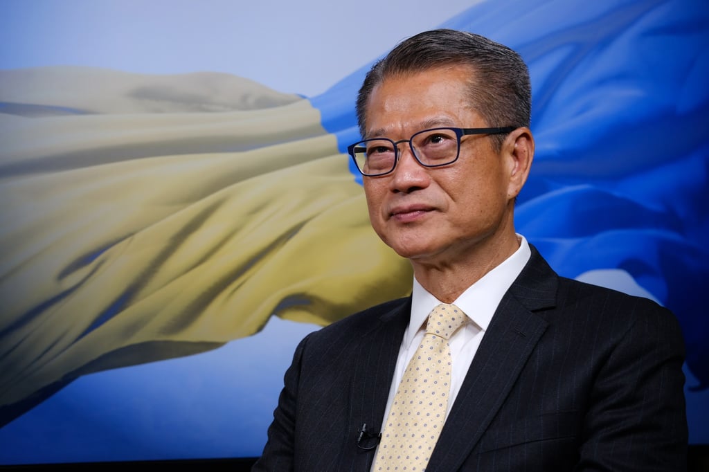 Finance secretary Paul Chan announces major investments in Hong Kong and says more will follow. Photo: Martin Chan