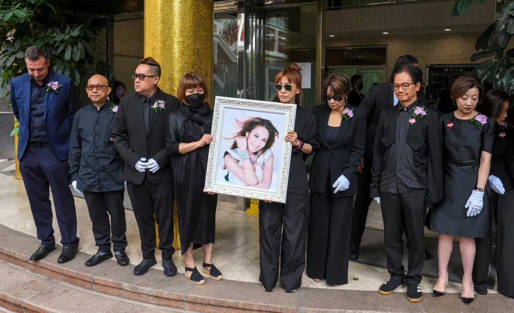Family members and friends (left to right) Jonathan Serbin, Roger Li, Billy Ho, Carol Lee, Nancy Lee, Jenny Tseng, Chien Yao and Lily Pang leave a service for the late Coco Lee. Photo: Elson Li Family members and friends (left to right) Jonathan Serbin, Roger Li, Billy Ho, Carol Lee, Nancy Lee, Jenny Tseng, Chien Yao and Lily Pang leave a service for the late Coco Lee. Photo: Elson Li