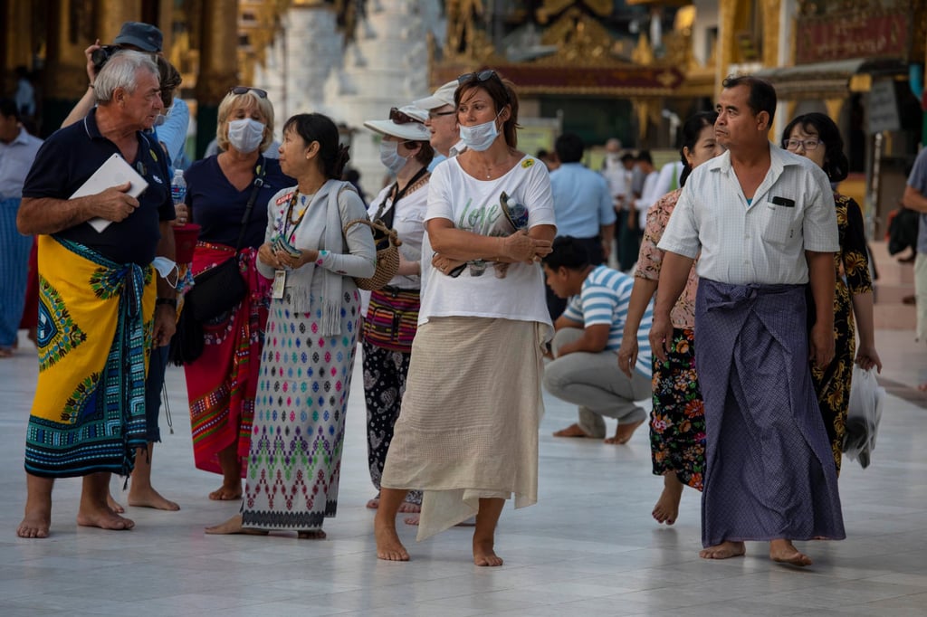 Tourists visit the Shwedagon pagoda in Yangon, Myanmar on March 3, 2020. Photo: Getty Images Tourists visit the Shwedagon pagoda in Yangon, Myanmar on March 3, 2020. Photo: Getty Images