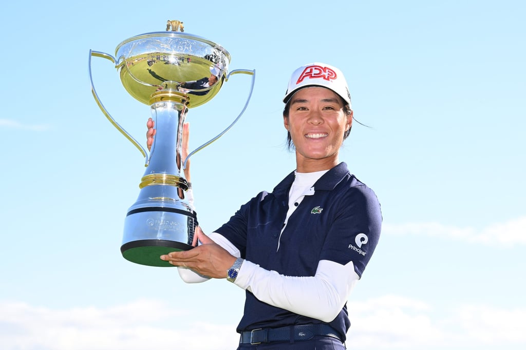Celine Boutier of France poses with the championship trophy. Photo: Octavio Passos/Getty Images