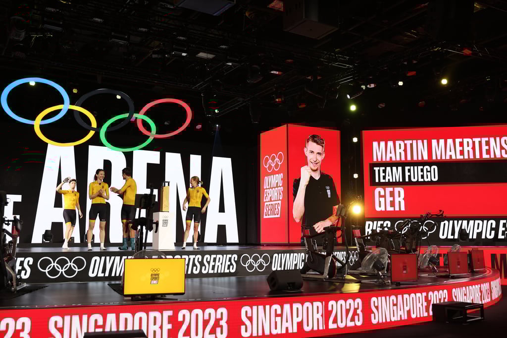 Team Fuego during the cycling competition at the inaugural Olympic Esports Week hosted in Singapore. Photo: Getty Images Team Fuego during the cycling competition at the inaugural Olympic Esports Week hosted in Singapore. Photo: Getty Images