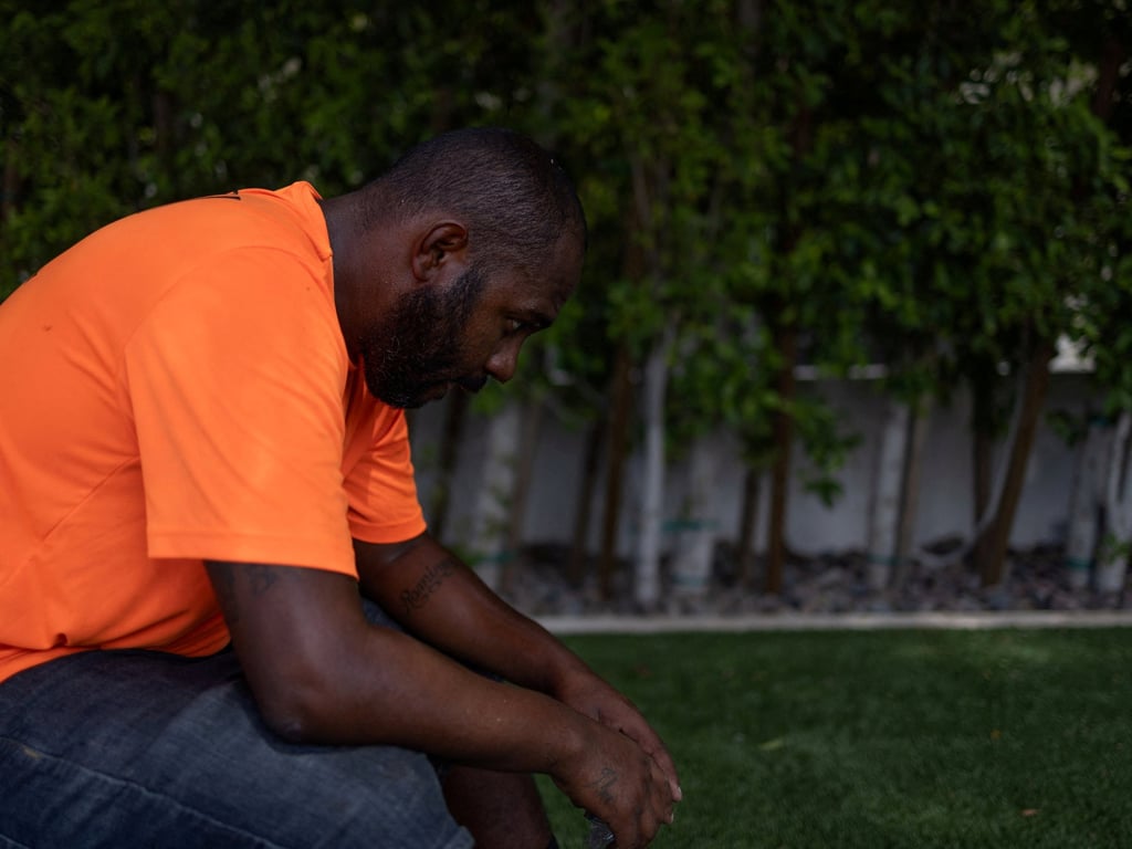 Ulises, a landscape worker from Mexico, takes a break during a heatwave in Phoenix, Arizona. Photo: Reuters